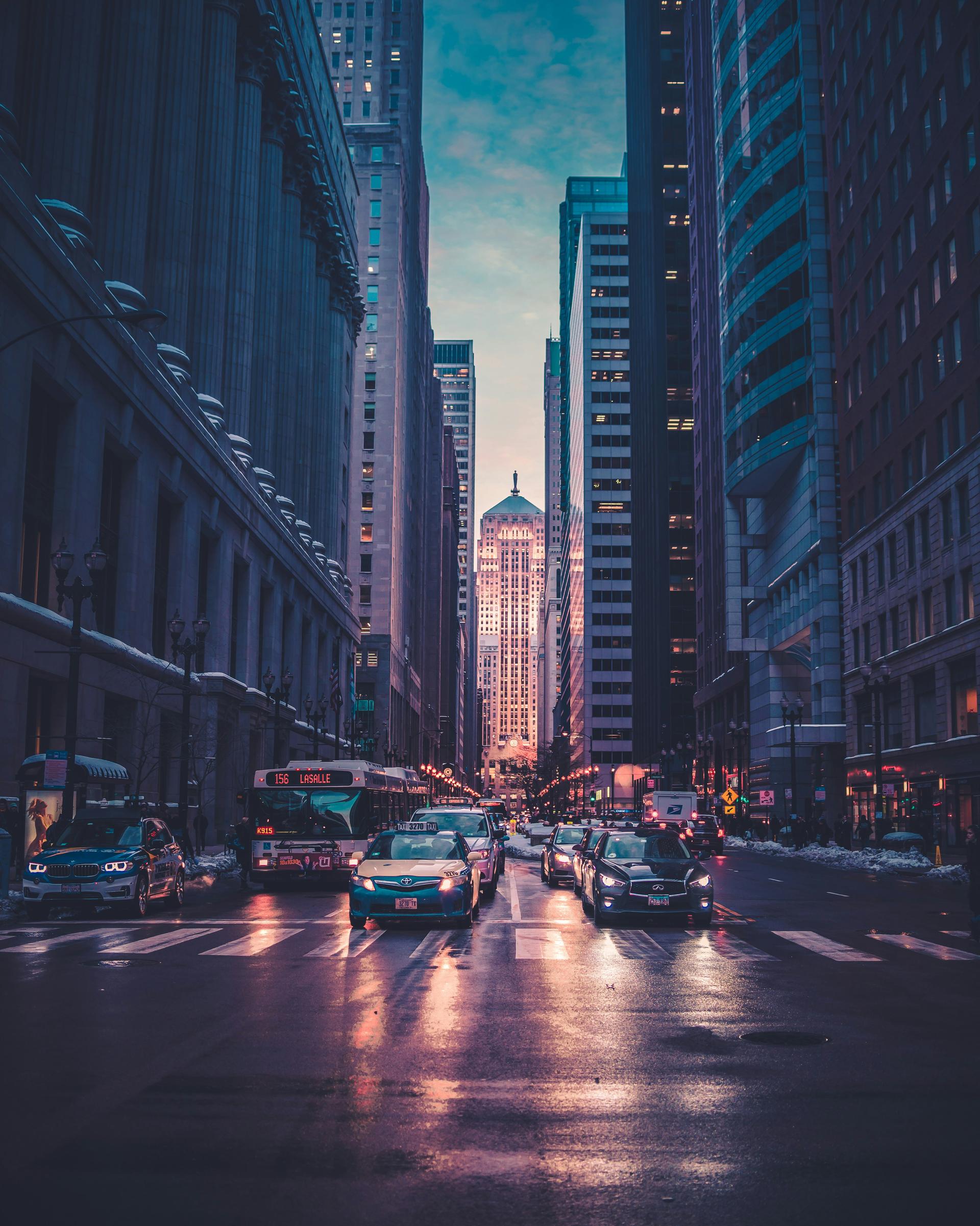 A city skyline glowing at dusk