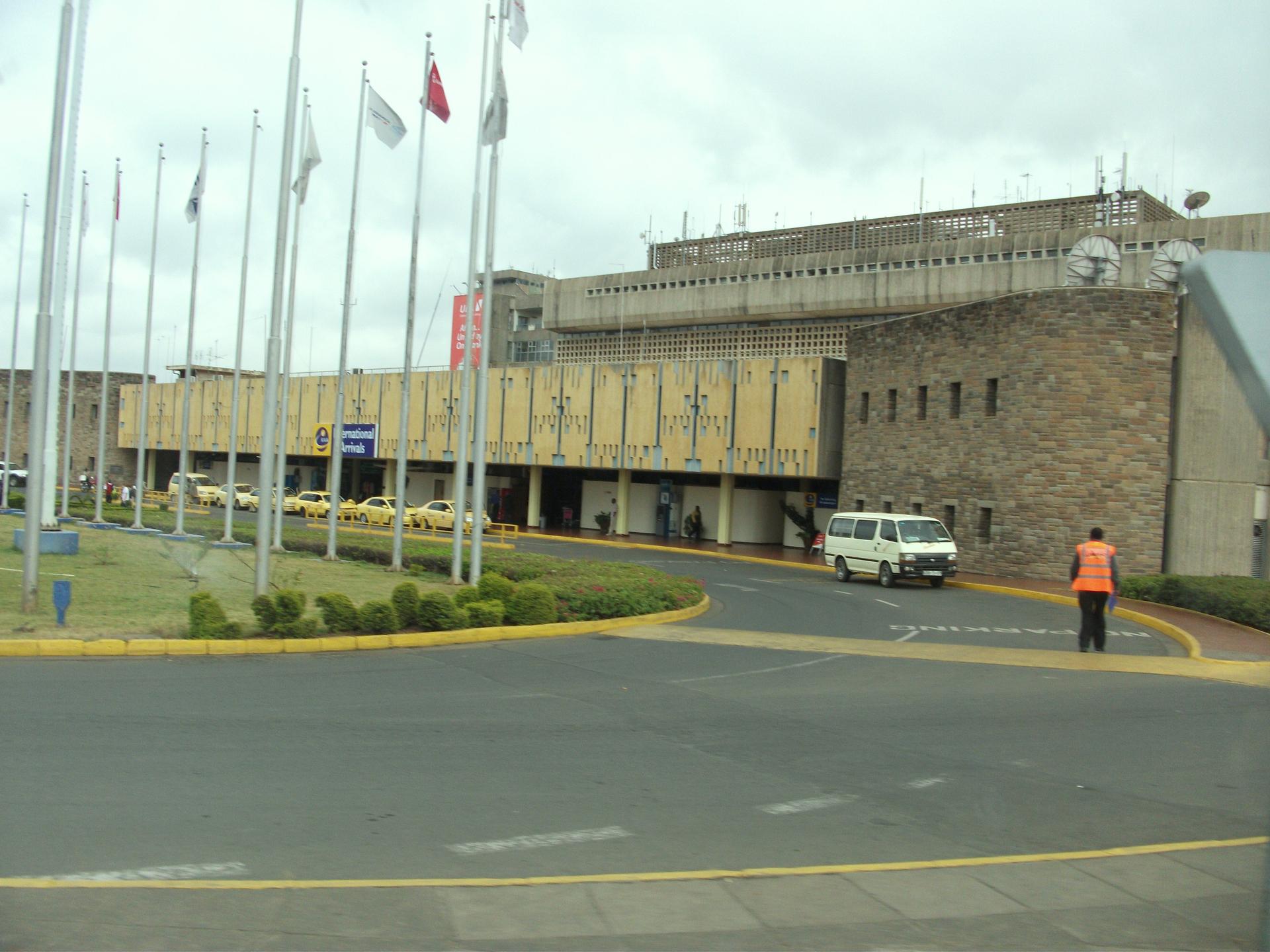 Travellers with trolleys in the international arrivals terminal at Nairobi's Jomo Kenyatta International Airport in Kenya