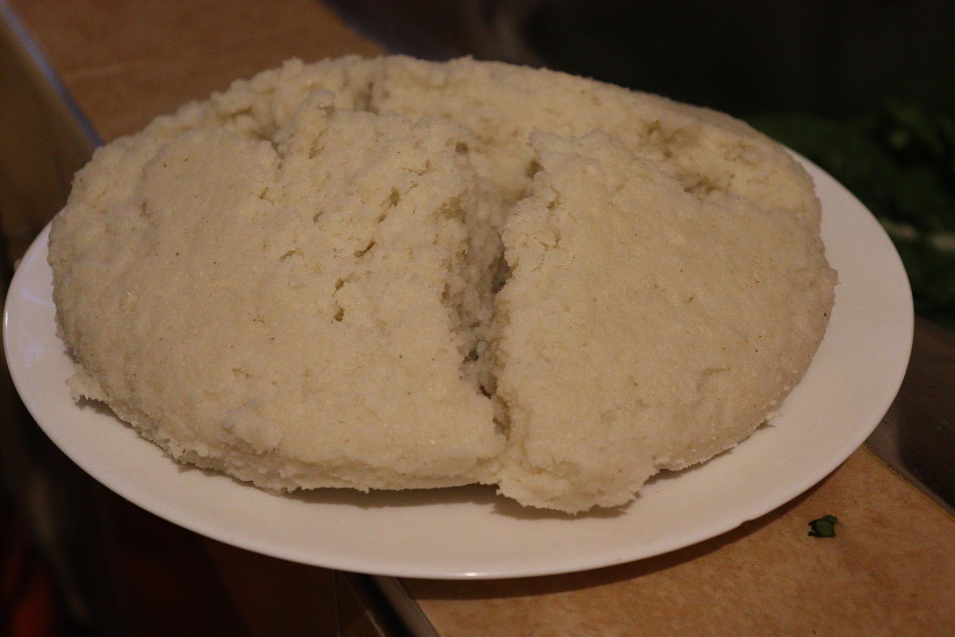 A plate of Kenyan ugali, the staple maize-meal dish whose price reflects rising food and packaging costs.