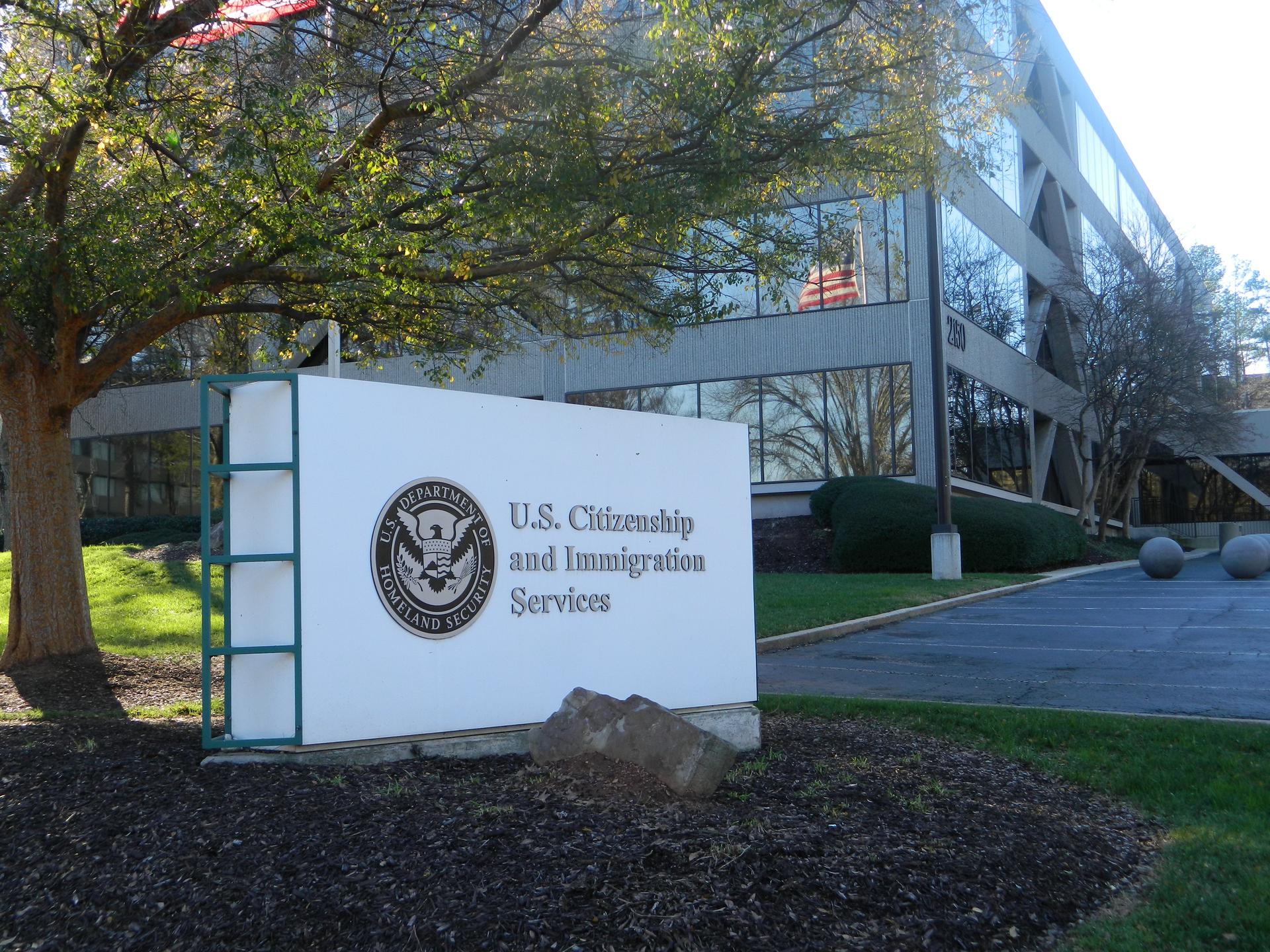 Exterior signage of a United States Citizenship and Immigration Services office building