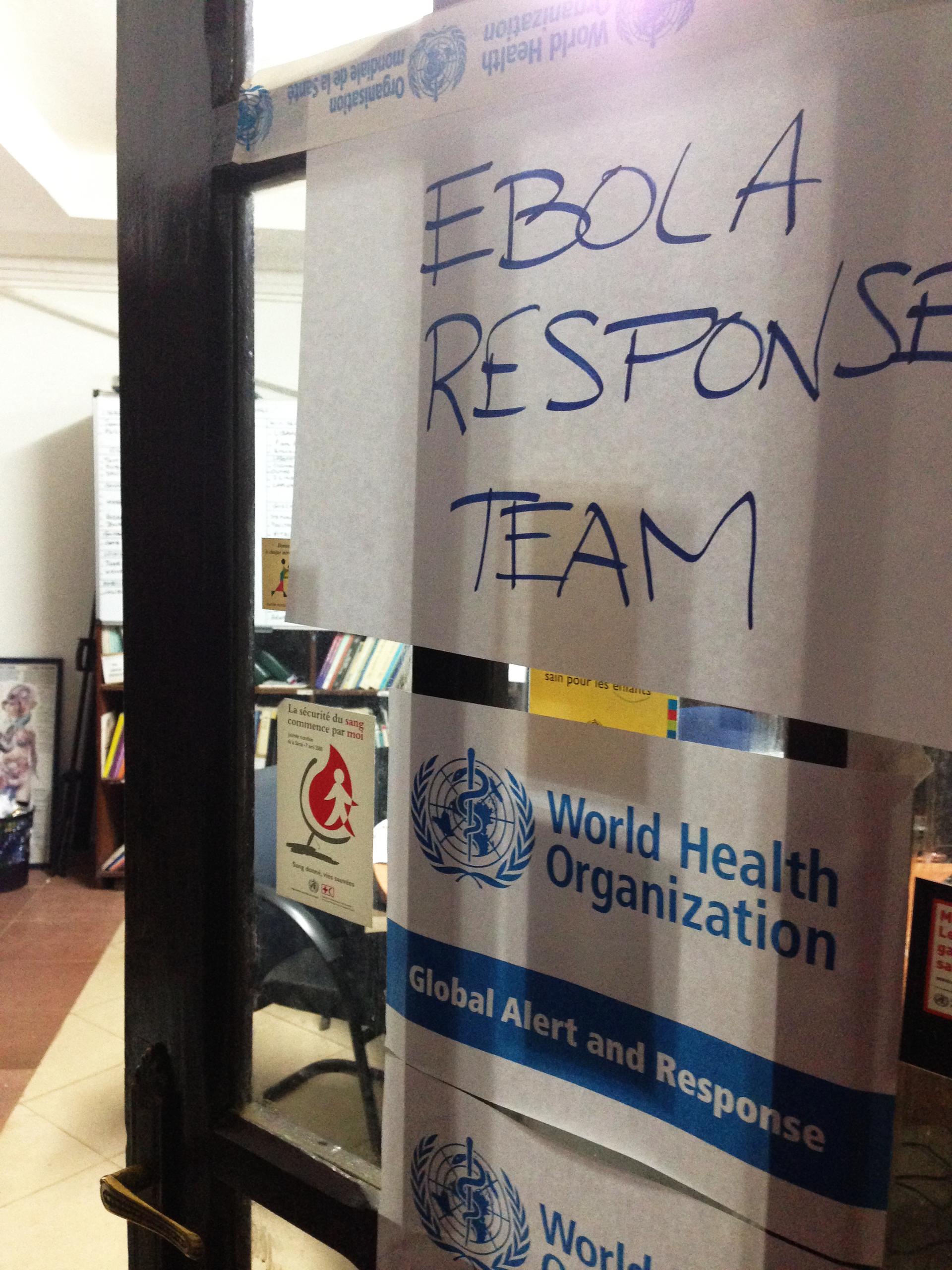 World Health Organization Ebola response signage at a field site in West Africa during the 2014 outbreak.