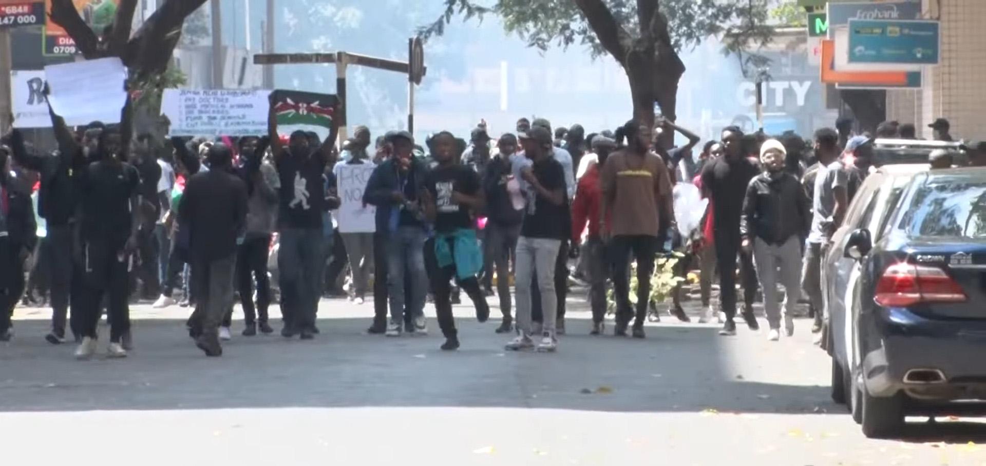 Young Kenyan protesters march through the streets of Nairobi during nationwide demonstrations.