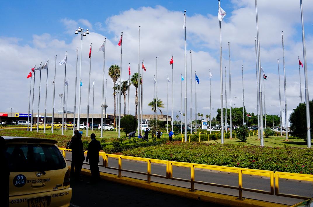 Travellers and aircraft at Jomo Kenyatta International Airport in Nairobi, Kenya's main international gateway