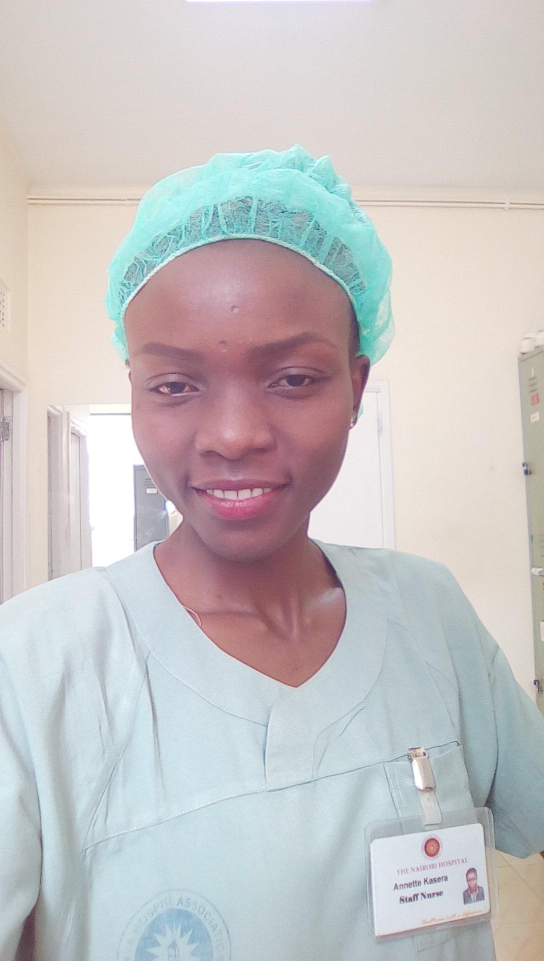 A theatre nurse in scrubs at work in an operating room at Nairobi Hospital, Kenya