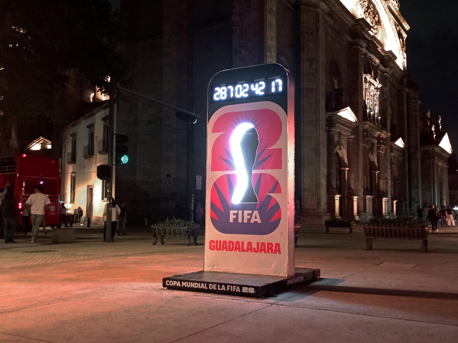A public countdown clock for the 2026 FIFA World Cup stands in a city square, marking the days to kickoff.