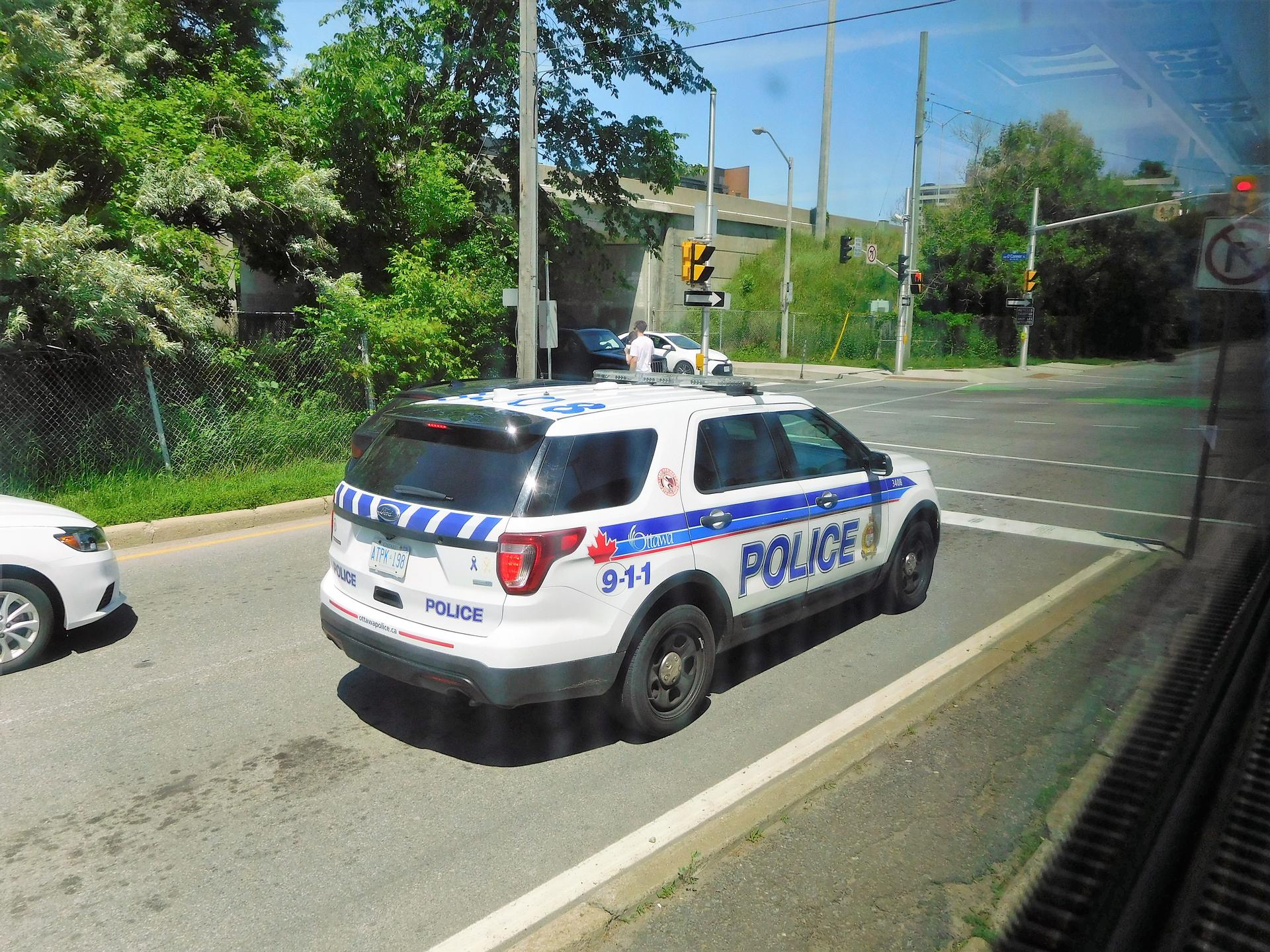 An Ottawa Police Service patrol vehicle on a city street, representing community policing in Canada's capital