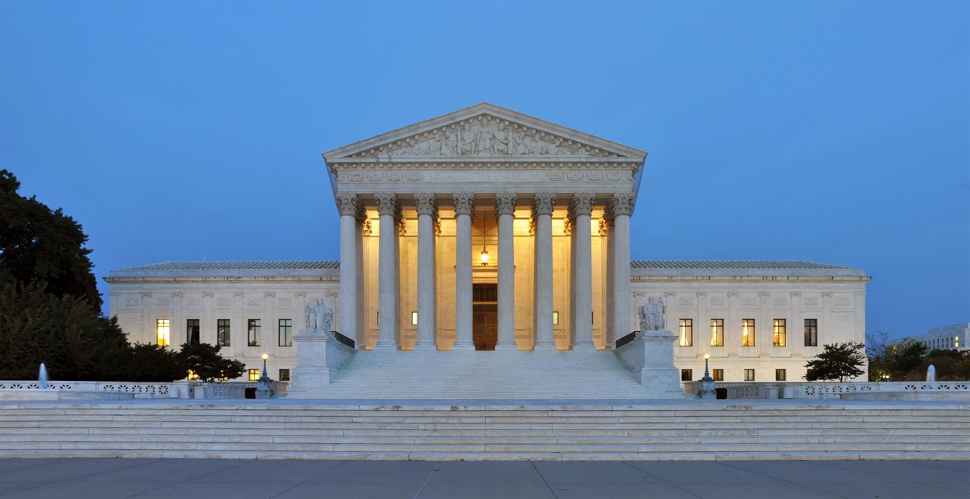 The west facade of the United States Supreme Court building in Washington, photographed at dusk