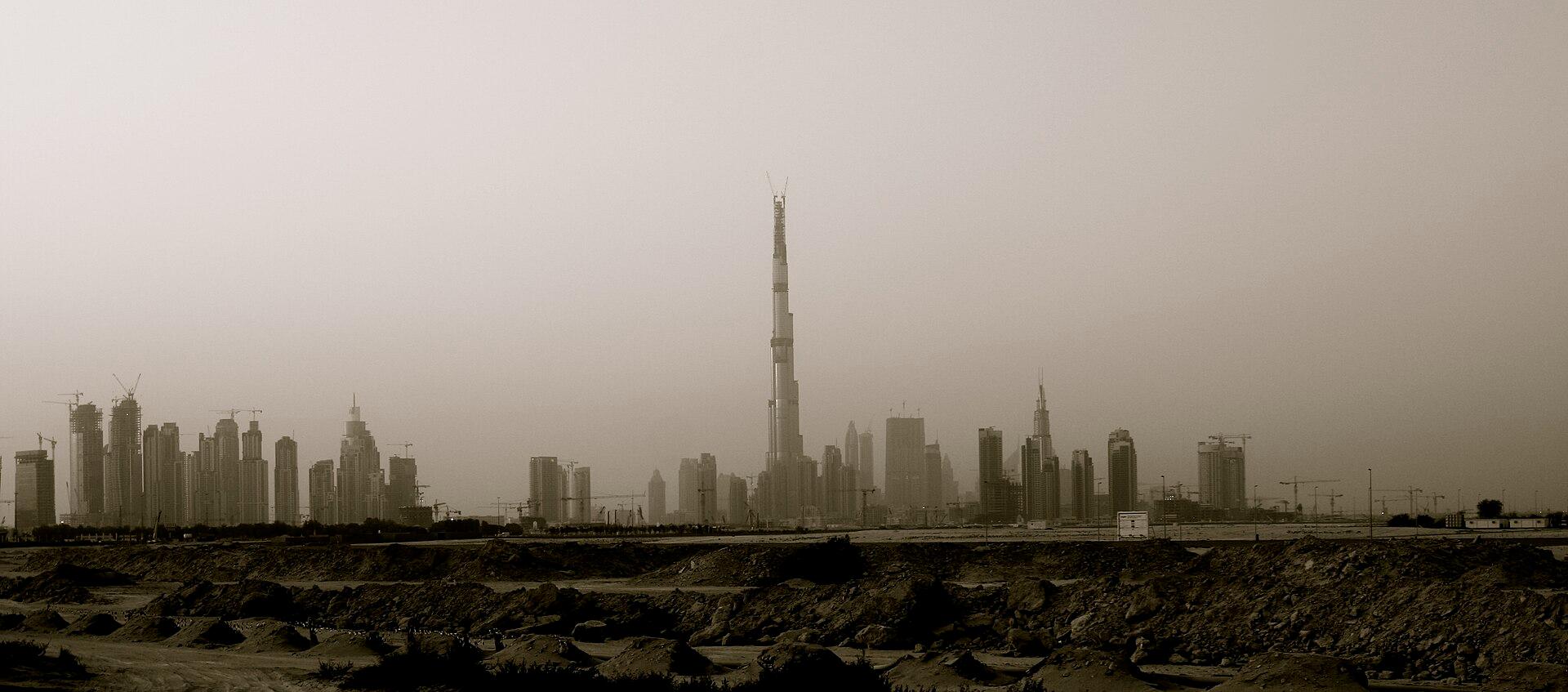 The Dubai skyline at dusk, with the Burj Khalifa rising above the city's towers in the United Arab Emirates.