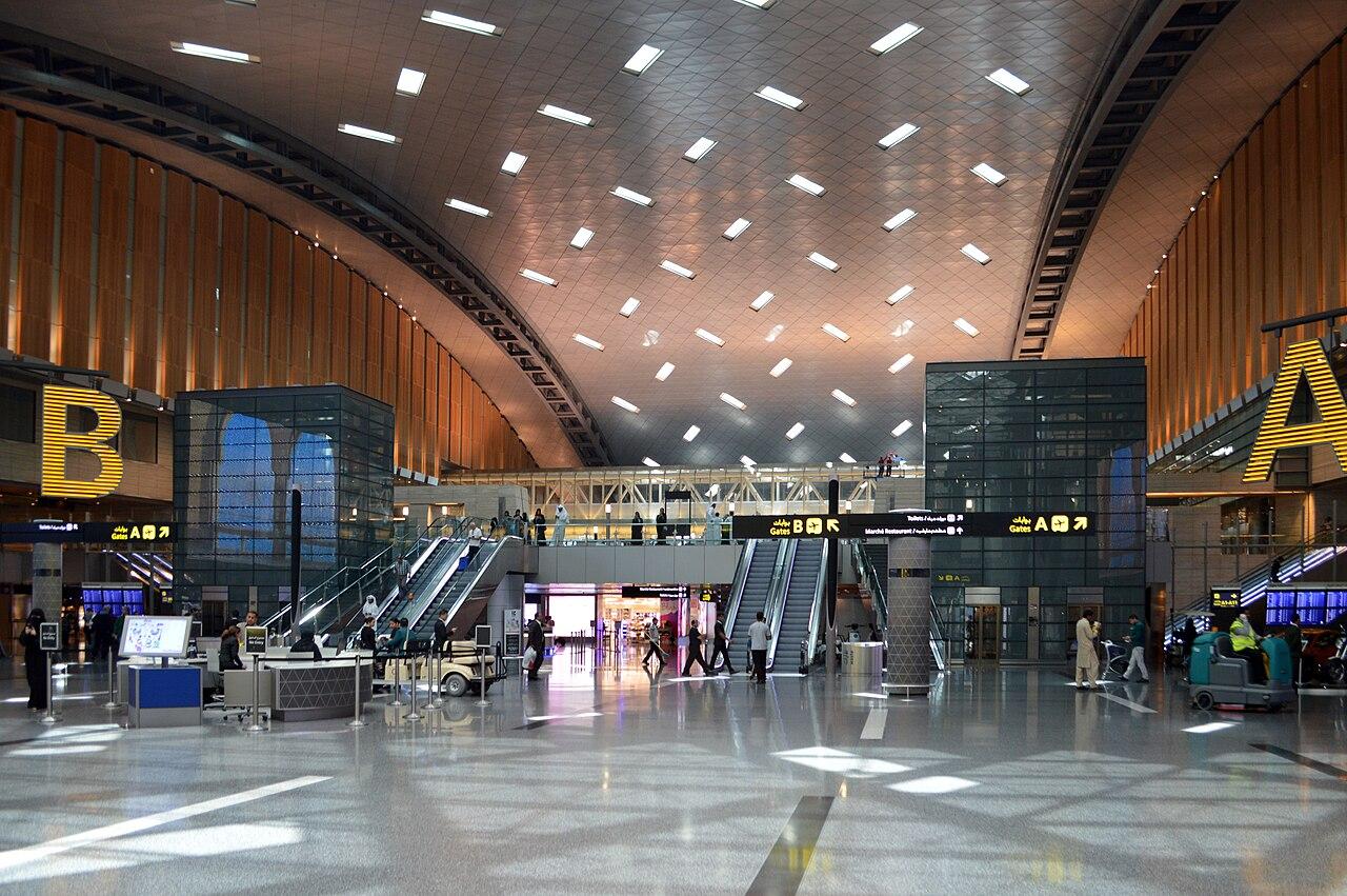 Travellers in the departures area of Hamad International Airport in Doha, Qatar, a major transit hub for Gulf-bound migrant workers