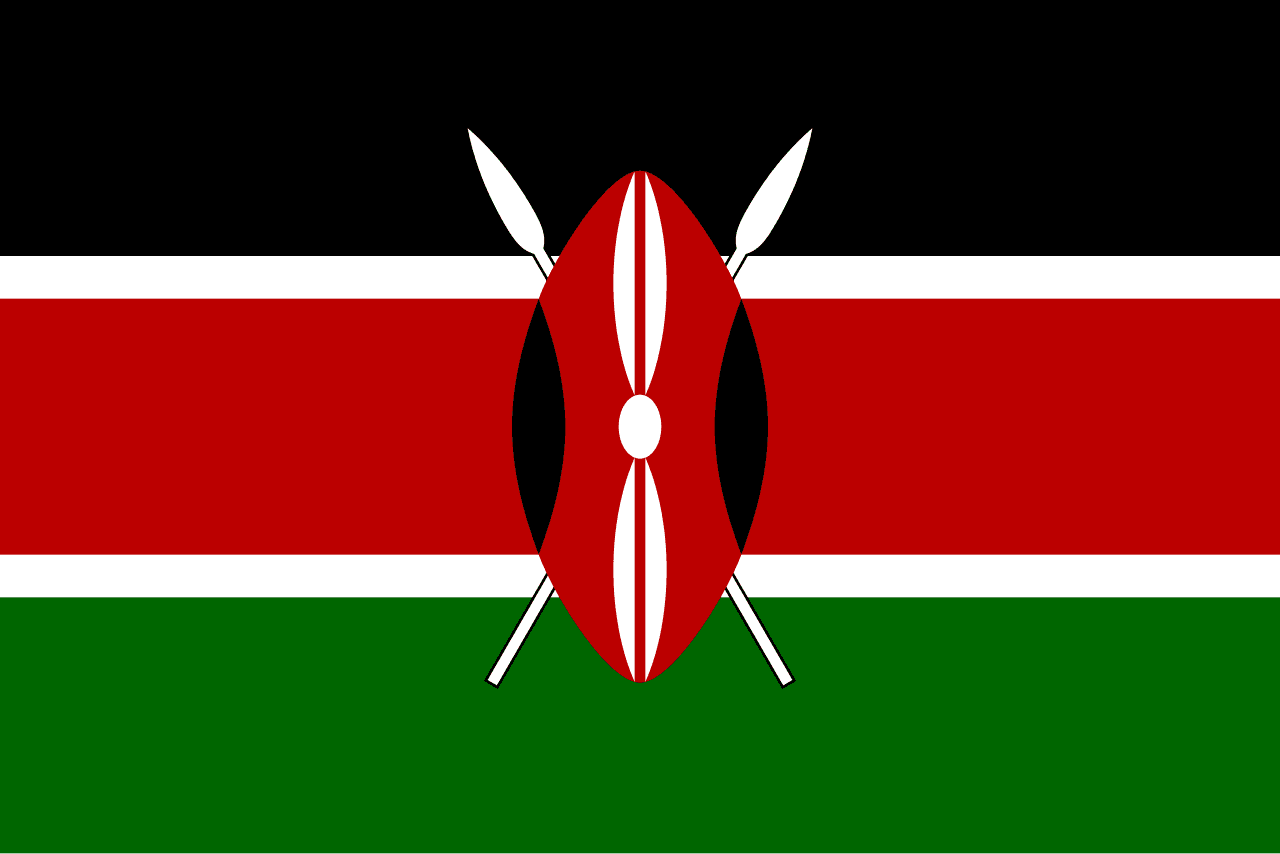 The national flag of Kenya — black, red, green and white with a Maasai shield — raised over the country's 63rd Madaraka Day celebrations.