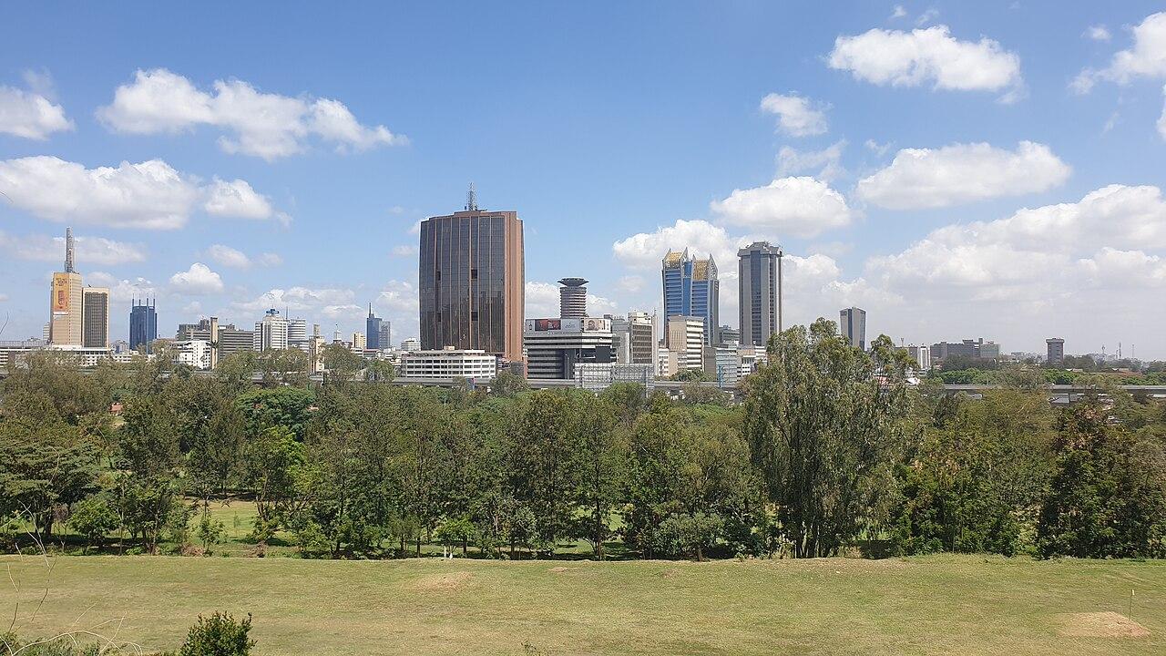 The Nairobi central business district skyline at dusk, the city where returning Kenyan migrants are expected to rebuild their lives and livelihoods.