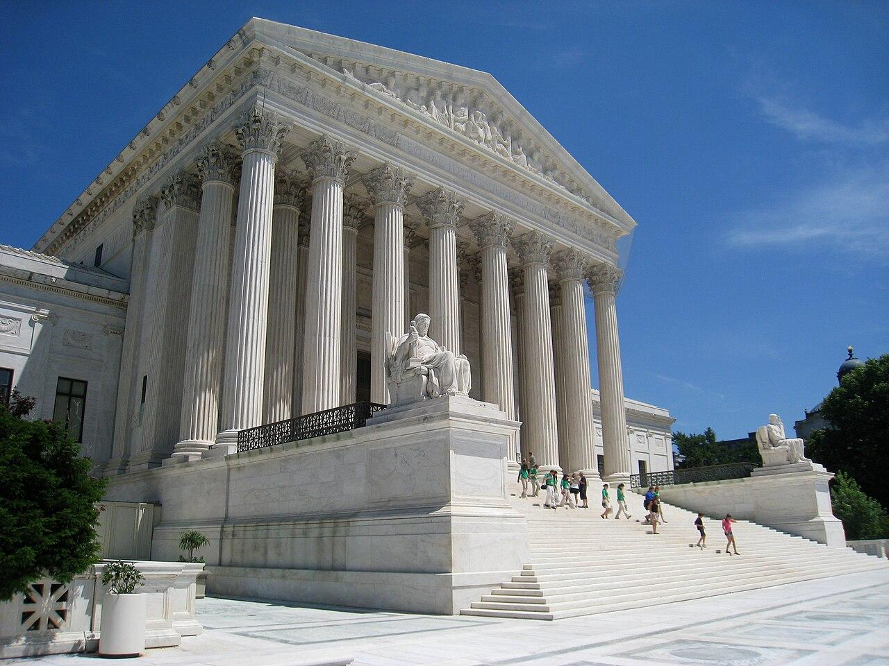The marble west facade and columns of the United States Supreme Court building in Washington, DC.