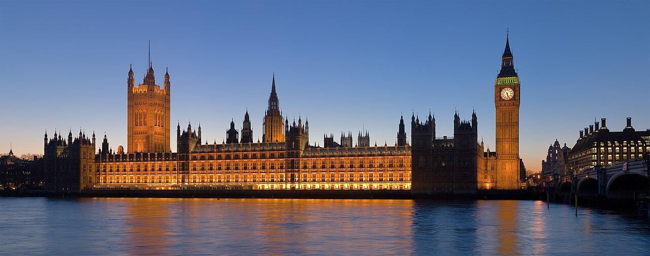 The Palace of Westminster and Big Ben seen across the River Thames in London at dusk