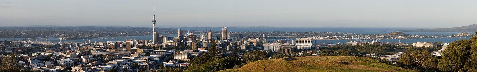 Panoramic skyline of Auckland, New Zealand, viewed across the harbour under a clear sky