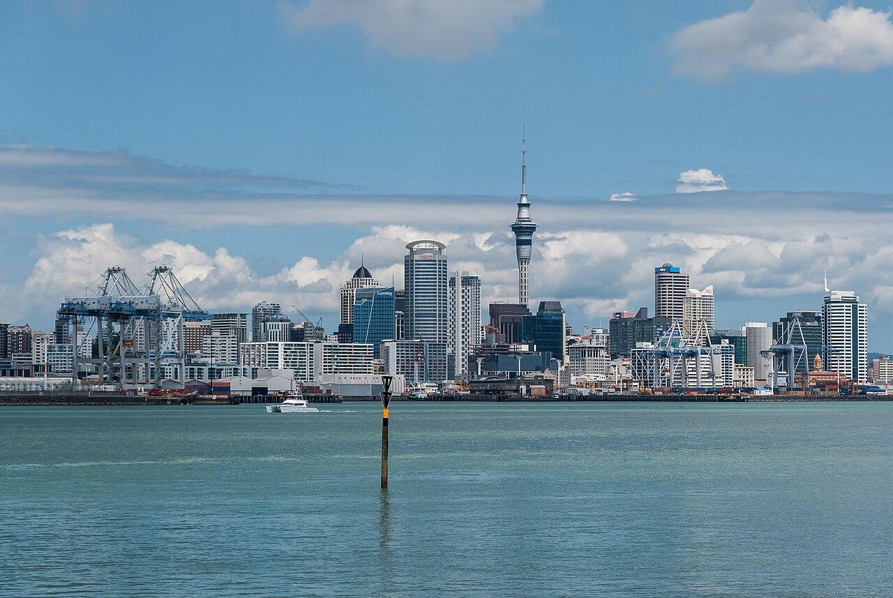 Auckland city skyline and Sky Tower seen across the harbour from Devonport, New Zealand