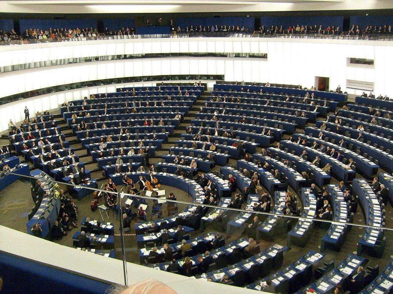 Interior of the European Parliament hemicycle in Strasbourg, where lawmakers voted to accelerate deportations.