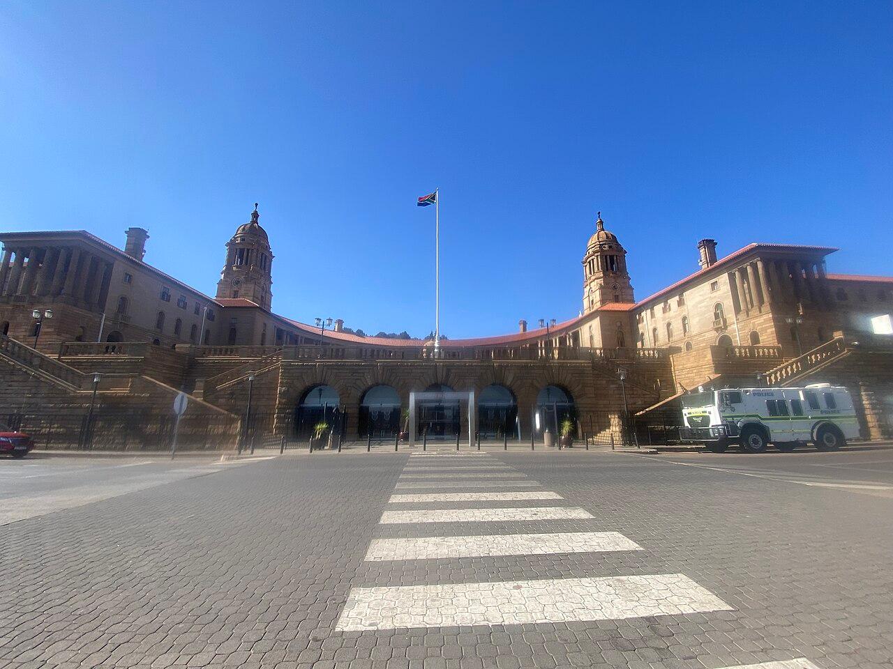 The sandstone facade and gardens of the Union Buildings in Pretoria, seat of the South African presidency
