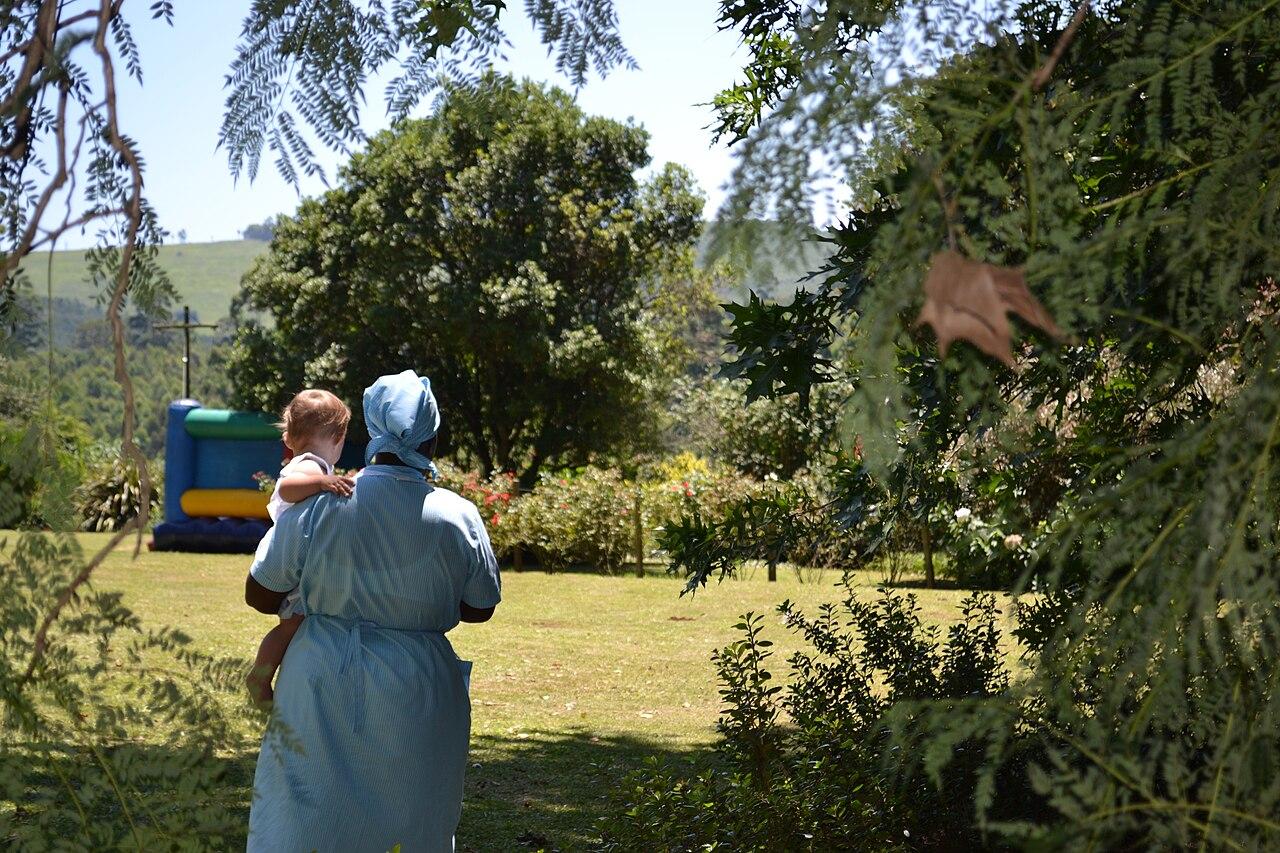 A domestic worker tends to household chores, illustrating Kenya's newly raised minimum wage for house helps and nannies.