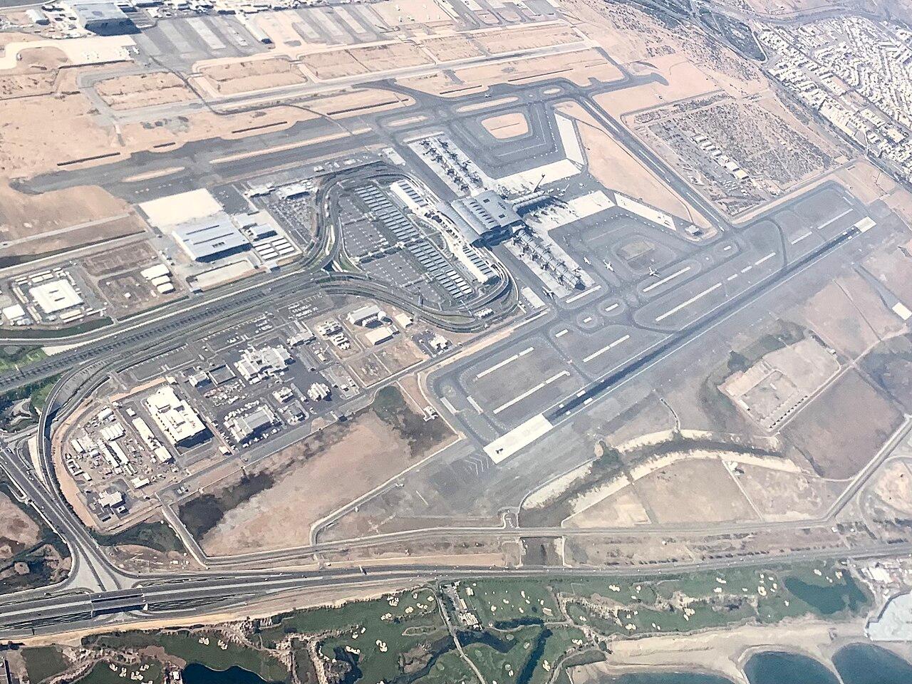 Aerial view of Muscat International Airport in Oman, a common arrival and departure point for migrant workers
