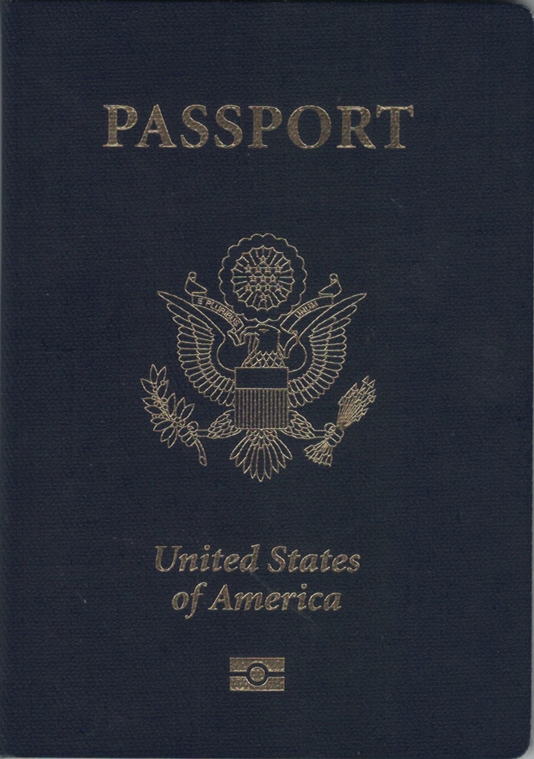 A blue United States passport on a flat surface, the small document at the centre of every adjustment-of-status decision.